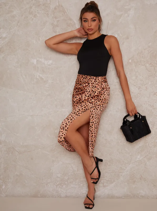Ruched Leopard Print Satin Midi Skirt in Brown sold by Chi Chi London
