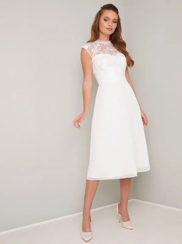 Lace Overlay Bodice Midi Dress in White sold by Chi Chi London