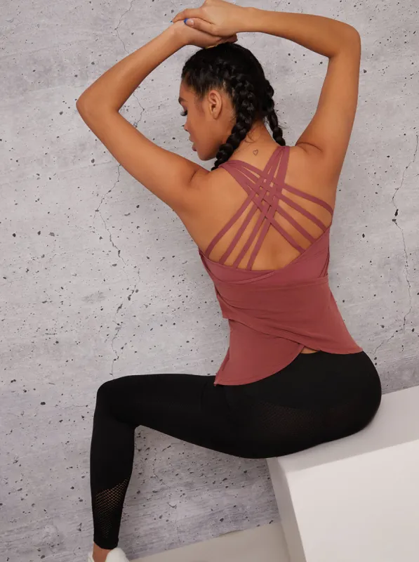 Racer Cross Back Sports Top in Pink sold by Chi Chi London