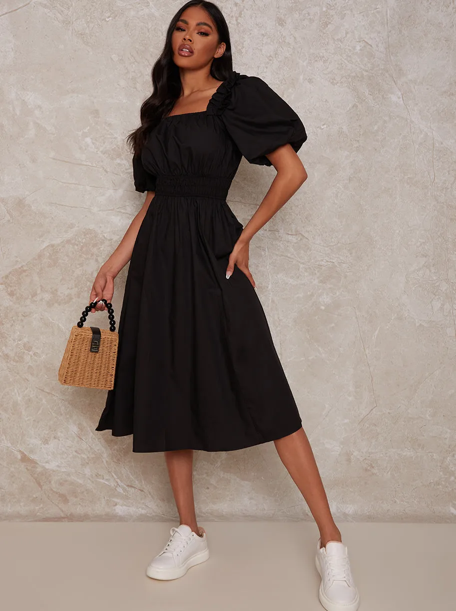 Puff Sleeve Cotton Midi Dress in Black sold by Chi Chi London