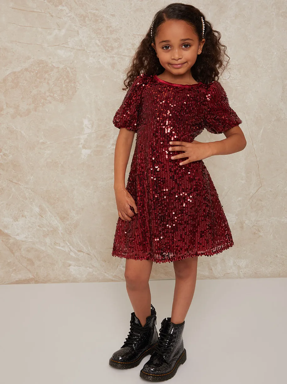 Girls Short Sleeve Sequin Midi Dress in Berry sold by Chi Chi London