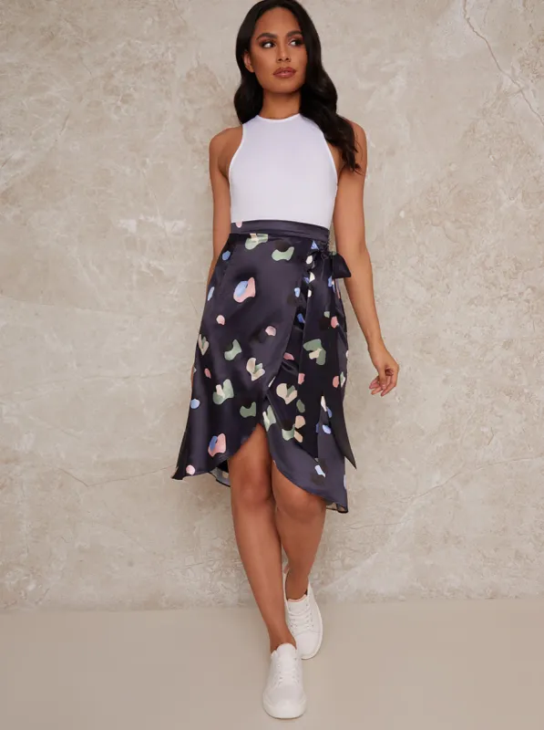 Geo Print Wrap Midi Skirt in Navy sold by Chi Chi London