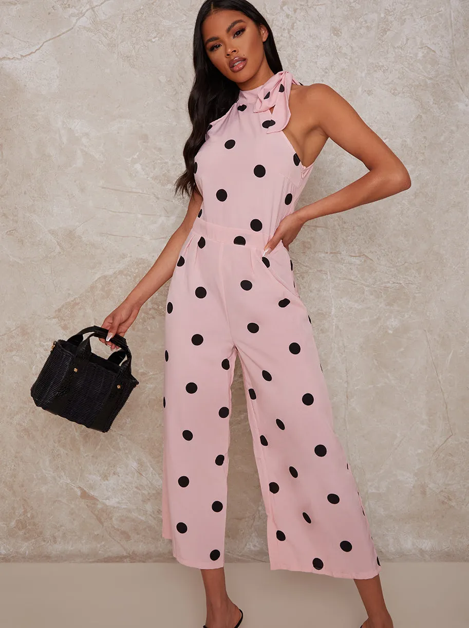 Polka Dot Halterneck Jumpsuit in Pink sold by Chi Chi London
