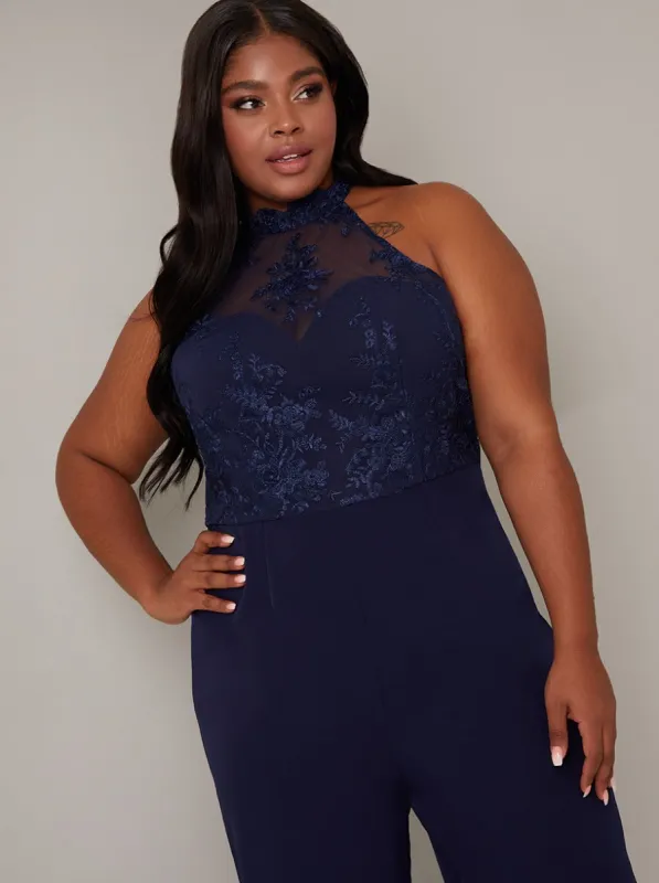 Plus Size Halter Neck Lace Wide Leg Jumpsuit in Blue sold by Chi Chi London