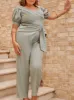 Plus Size Puff Sleeve Bardot Jumpsuit in Green sold by Chi Chi London