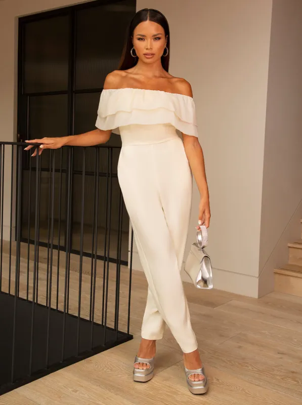 Ruffle Organza Jumpsuit in Cream sold by Chi Chi London