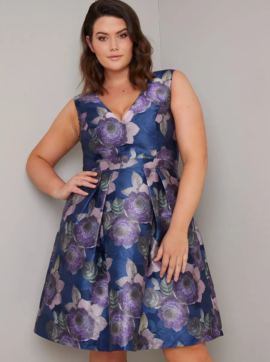 Plus Size V Neck Floral Print Mini Dress in Blue sold by Chi Chi London