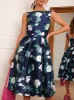 Boat Neck Floral Print Skater Dress in Navy sold by Chi Chi London