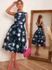 Boat Neck Floral Print Skater Dress in Navy sold by Chi Chi London