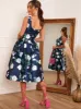 Boat Neck Floral Print Skater Dress in Navy sold by Chi Chi London