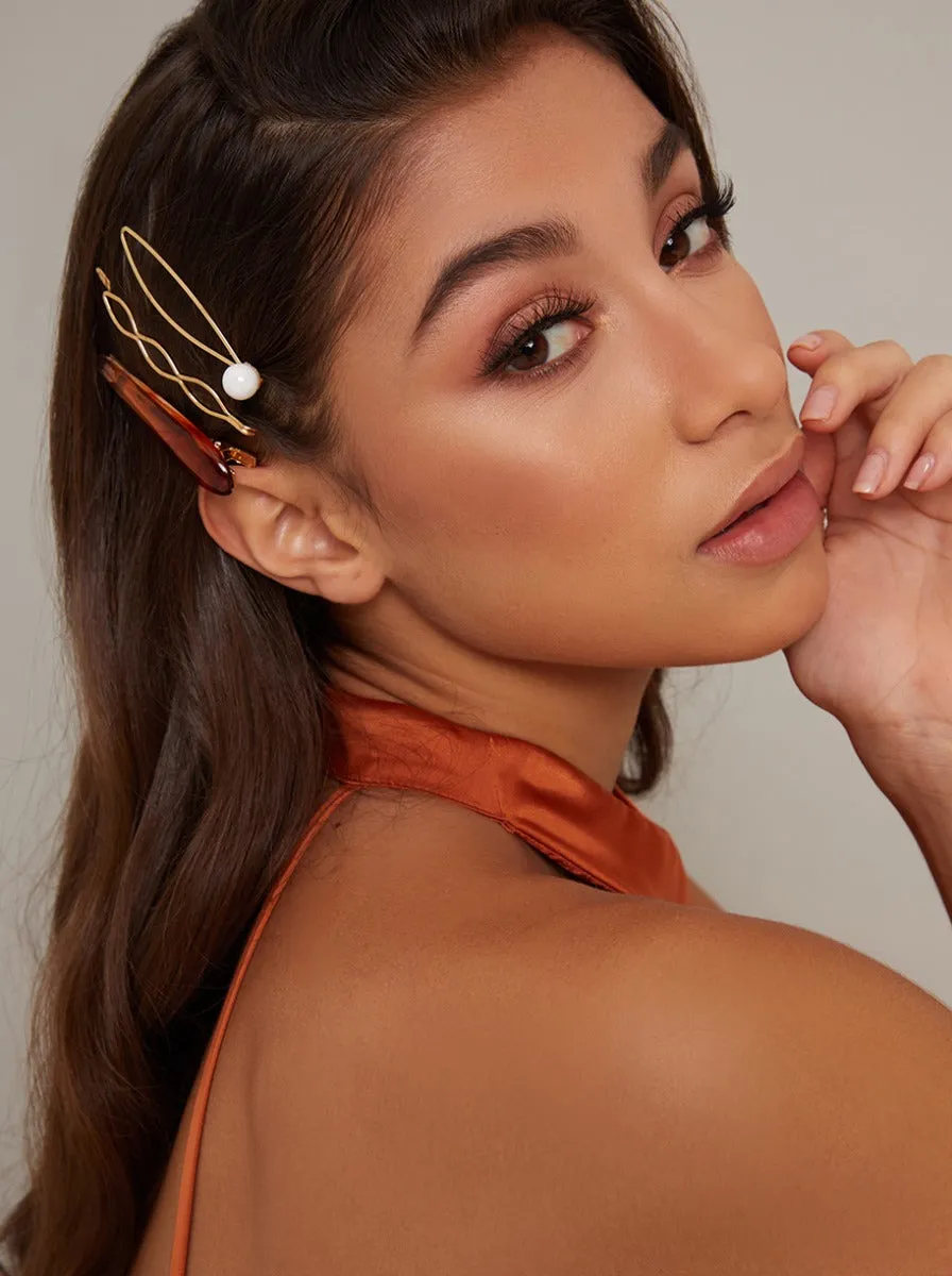 Assorted 3 Pack Hair Clips in Gold Tone sold by Chi Chi London