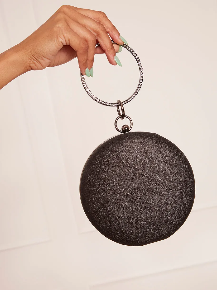 Diamante Ring Handle Glitter Bag in Black sold by Chi Chi London