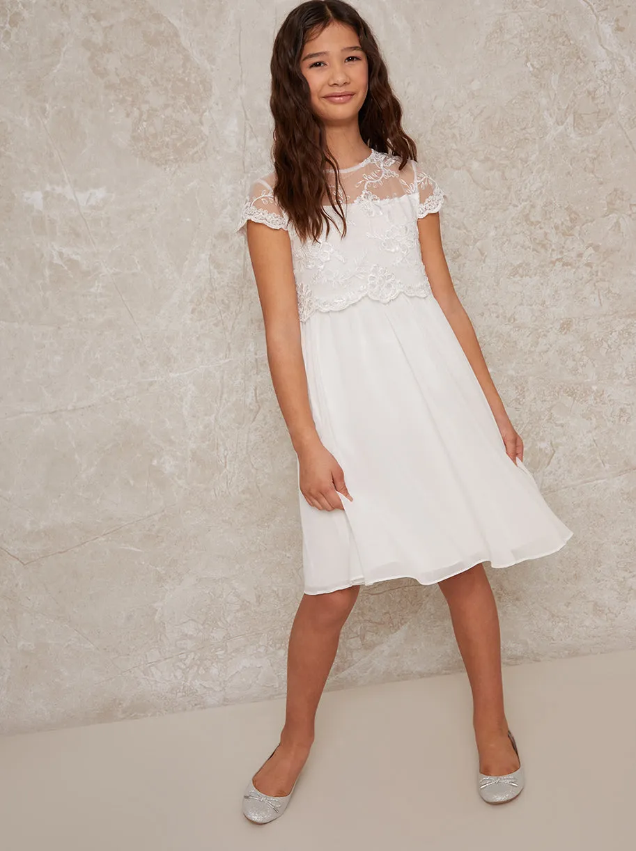 Girls Short Sleeve Embroidered Dress in White sold by Chi Chi London