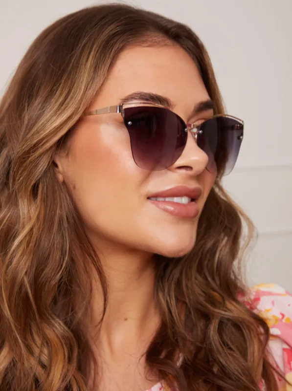 Rimless Detail Sunglasses in Black sold by Chi Chi London