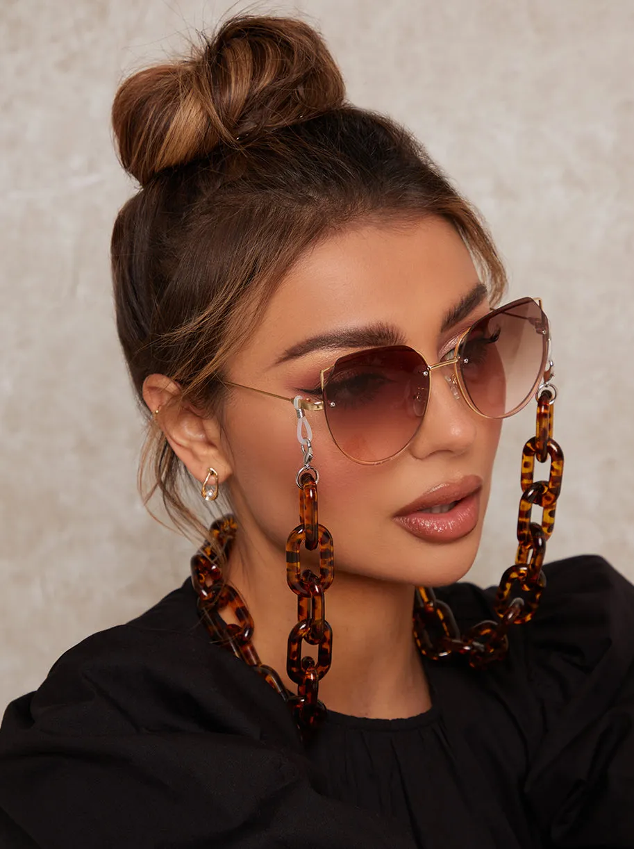 Chunky Tortoiseshell Sunglasses Chain in Brown sold by Chi Chi London product image thumbnail 2