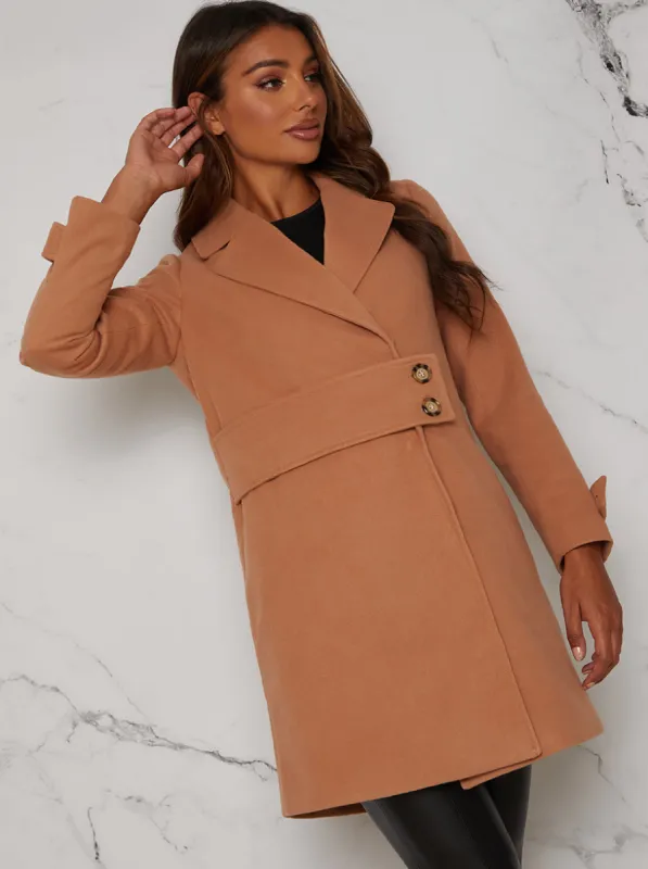 Structured Coat with Button-Up Waist Panel in Tan sold by Chi Chi London