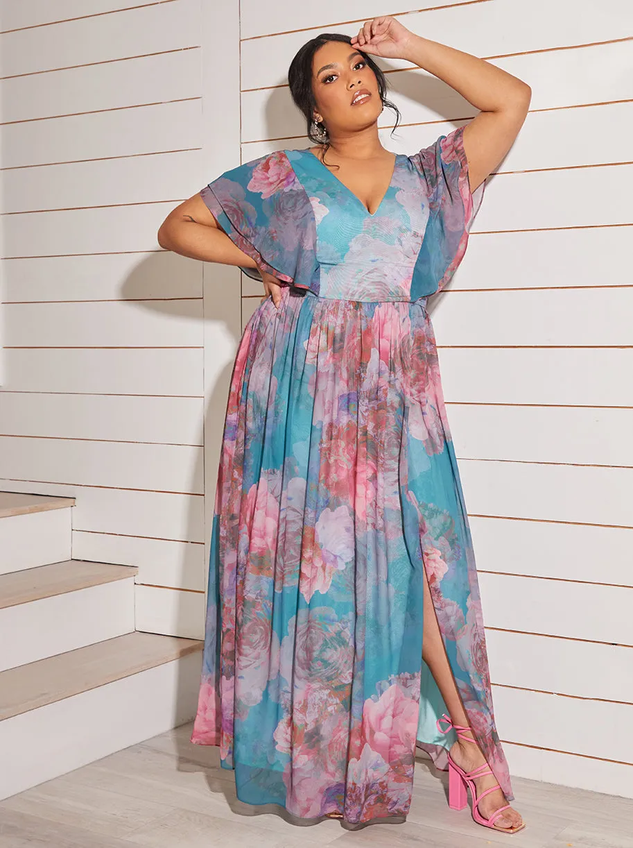 Plus Size Angel Sleeve Floral Maxi Dress in Green sold by Chi Chi London