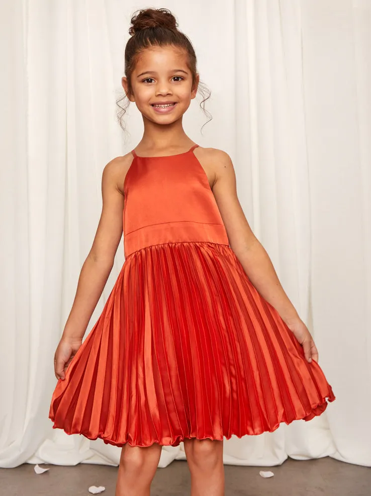 Younger Girls Pleated Satin Flower Girl Dress in Rust sold by Chi Chi London