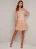 Lace Overlay Long Sleeved Dress In Rose Gold sold by Chi Chi London