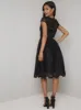 Lace Overlay Cap Sleeve Midi Dress in Black sold by Chi Chi London