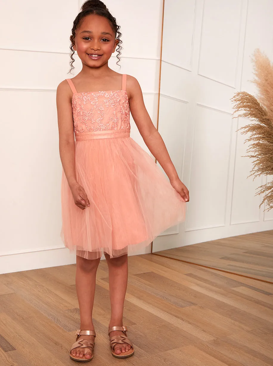 Younger Girls Embroidered Lace Tulle Midi Dress in Coral sold by Chi Chi London