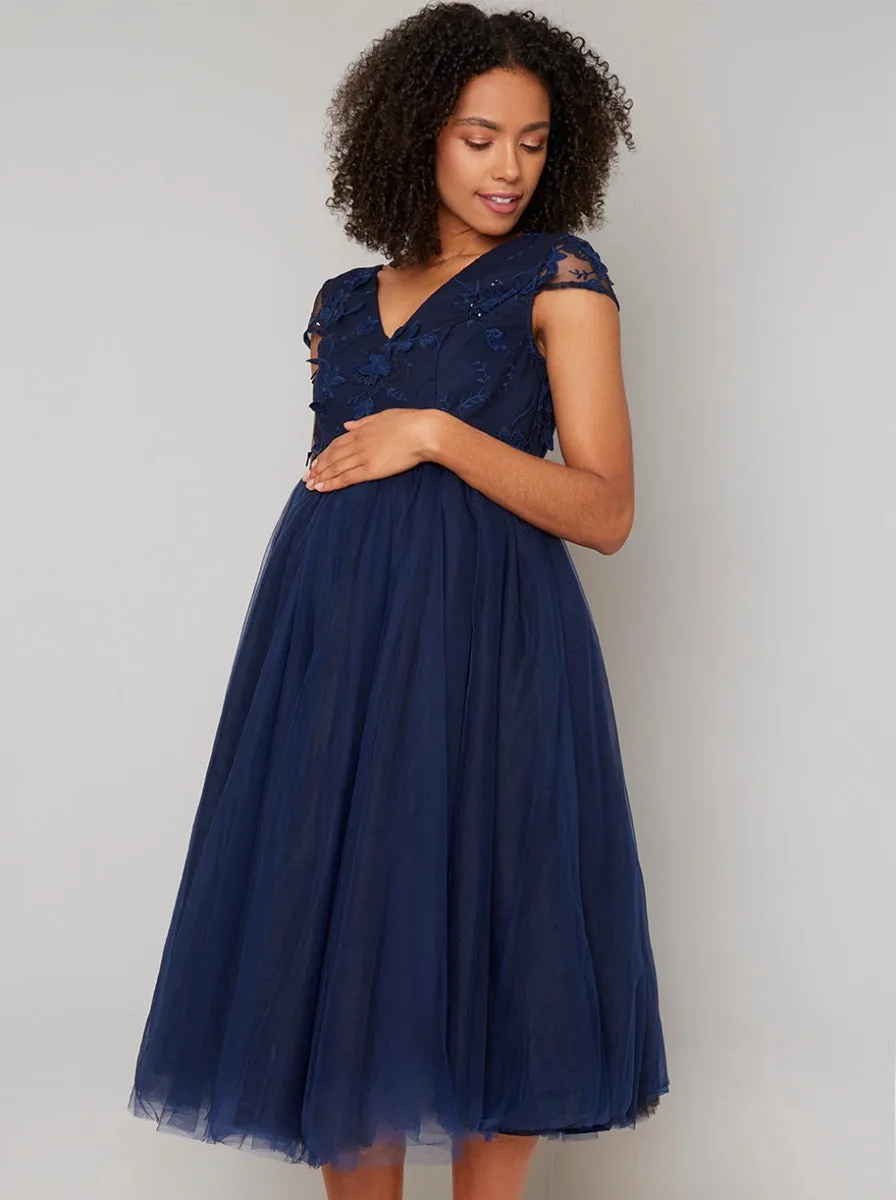 Maternity Cap Sleeve 3D Floral Bodice Skater Dress in Navy sold by Chi Chi London
