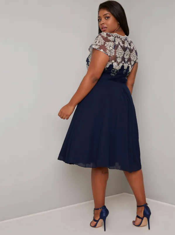 Plus Size Lace Bodice Chiffon Midi Dress in Blue sold by Chi Chi London
