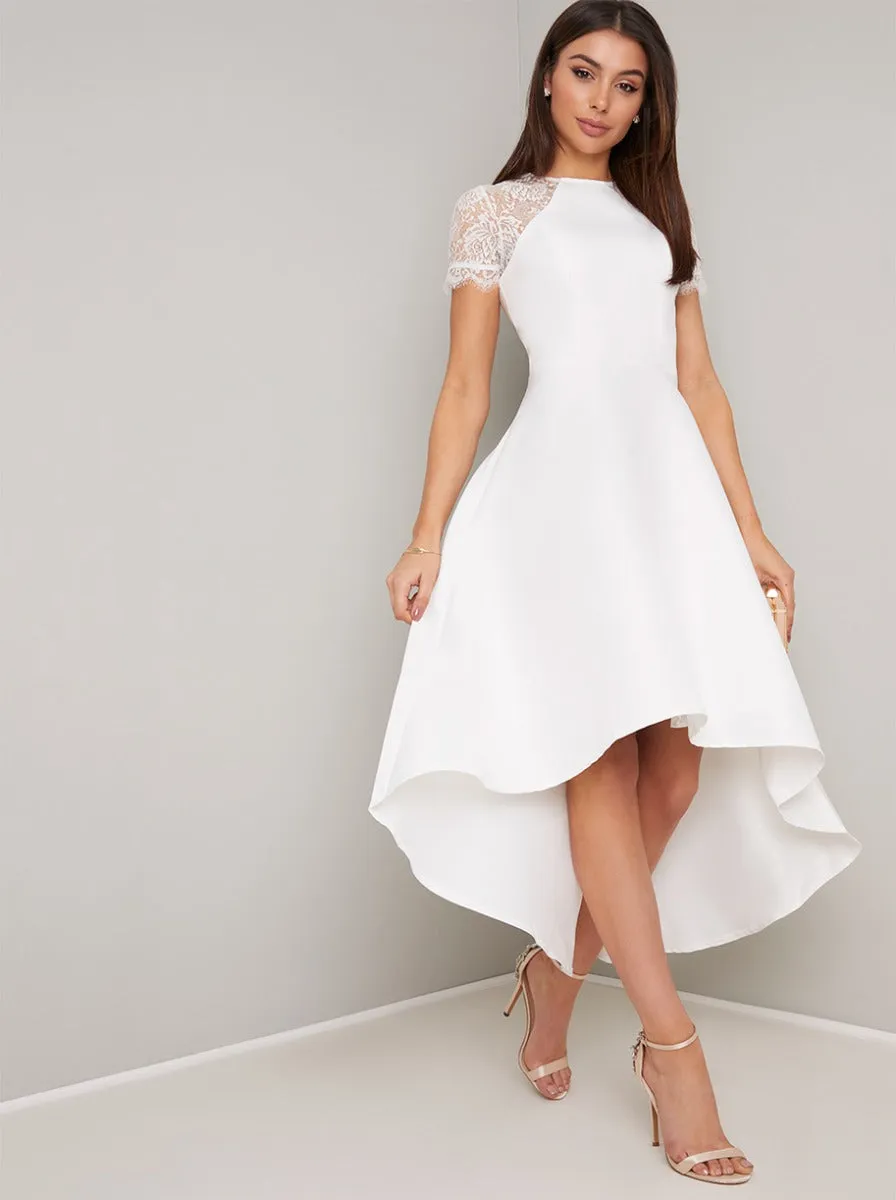 Sheer Lace Bodice Dip Hem Midi Dress in White sold by Chi Chi London