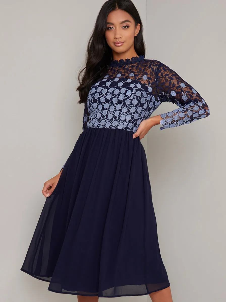 Petite Lace Long Sleeved Midi Dress In Navy sold by Chi Chi London