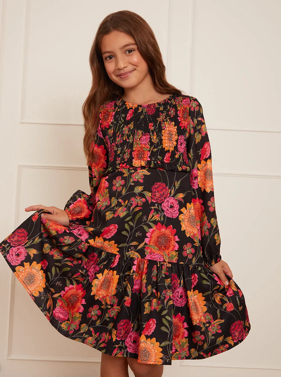 Older Girls Long Sleeve Floral Smock Dress in Black sold by Chi Chi London