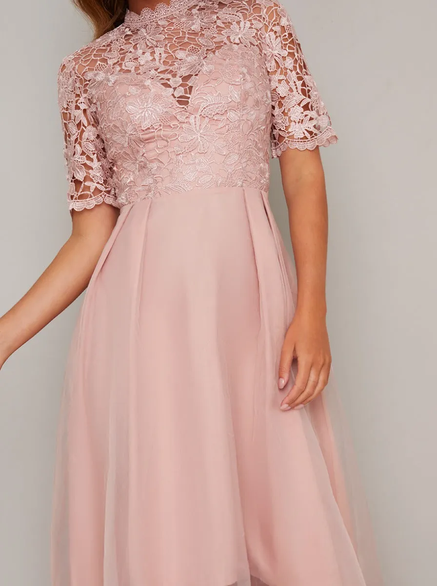 Short Sleeved Sheer Lace Dip Hem Midi Dress in Rose Gold sold by Chi Chi London product image thumbnail 4
