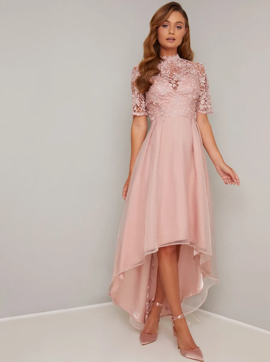 Short Sleeved Sheer Lace Dip Hem Midi Dress in Rose Gold sold by Chi Chi London