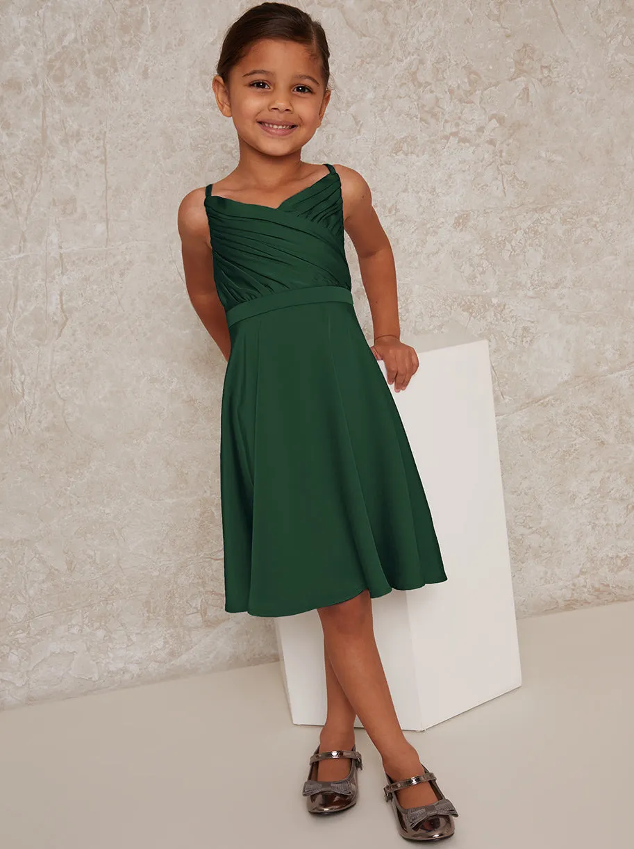 Girls Pleat Bodice Satin Finish Dress in Green sold by Chi Chi London