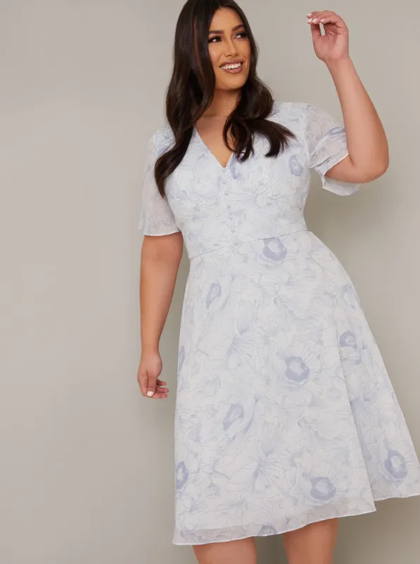 Plus Size Floral Day Dress with Chiffon Sleeve in White sold by Chi Chi London