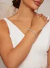 Jewelled Bracelet with Clasp Fastening in Silver sold by Chi Chi London
