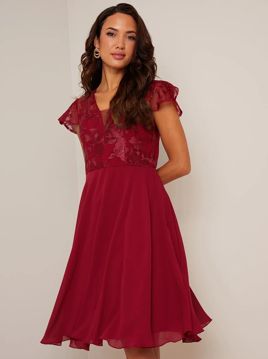 V Neck Embroidered Midi Dress in Red sold by Chi Chi London