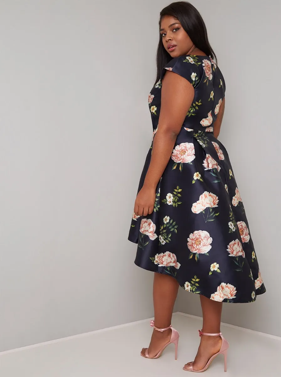 Plus Size Floral Print Dip Hem Midi Dress in Navy sold by Chi Chi London