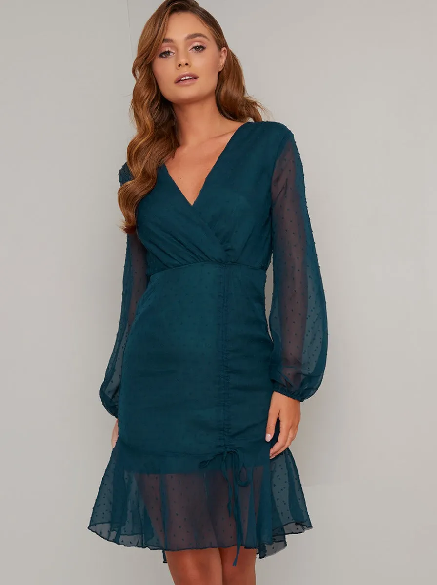 Polka Dot Balloon Sleeve Midi Dress in Green sold by Chi Chi London