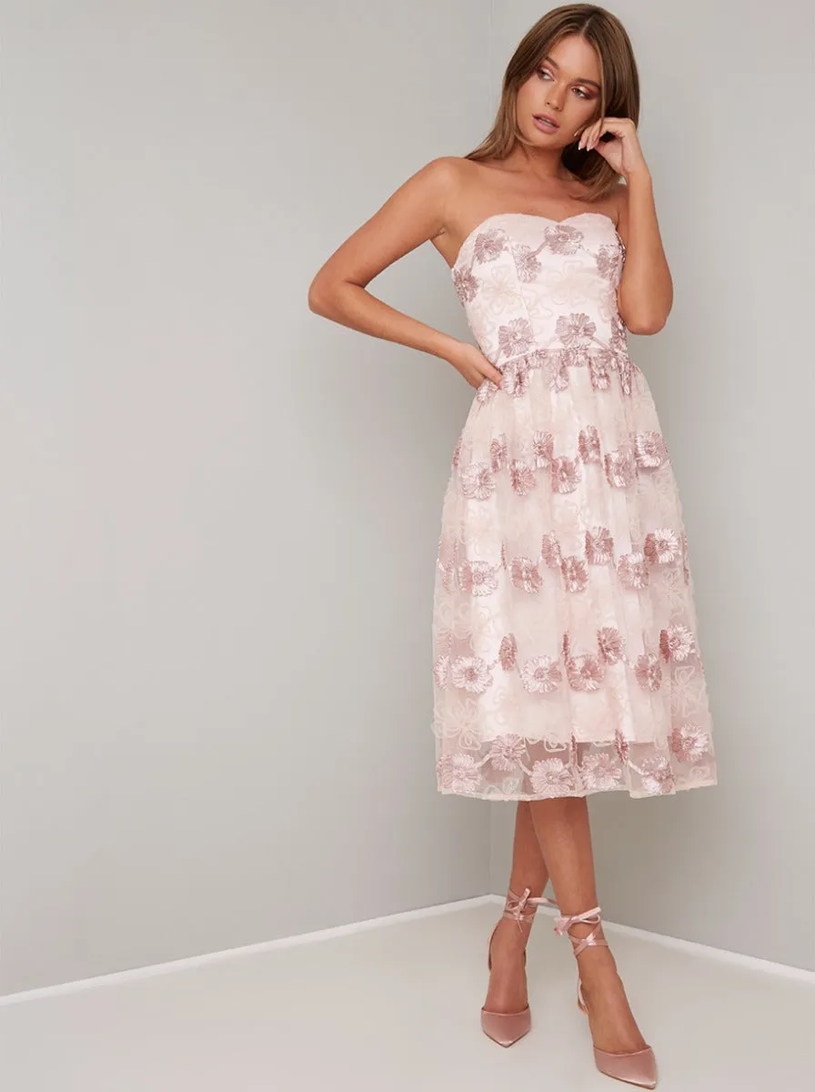Embroidered Floral Bandeau Midi Dress in Pink sold by Chi Chi London
