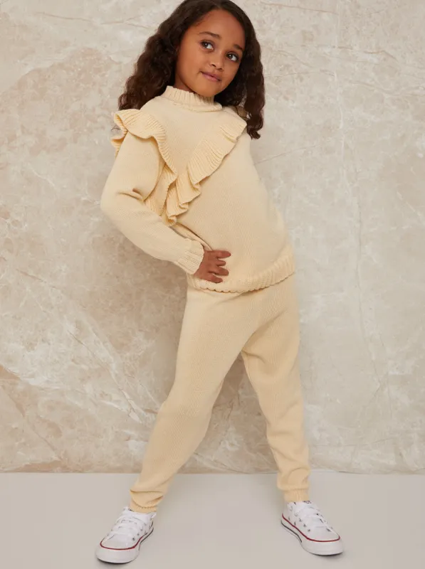 Girls Ruffle Detail Lounge Set in Cream sold by Chi Chi London