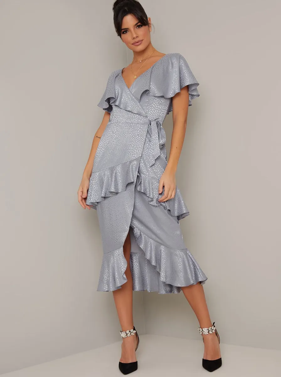 Satin Finish Ruffle Wrap Style Midi Dress in Blue sold by Chi Chi London