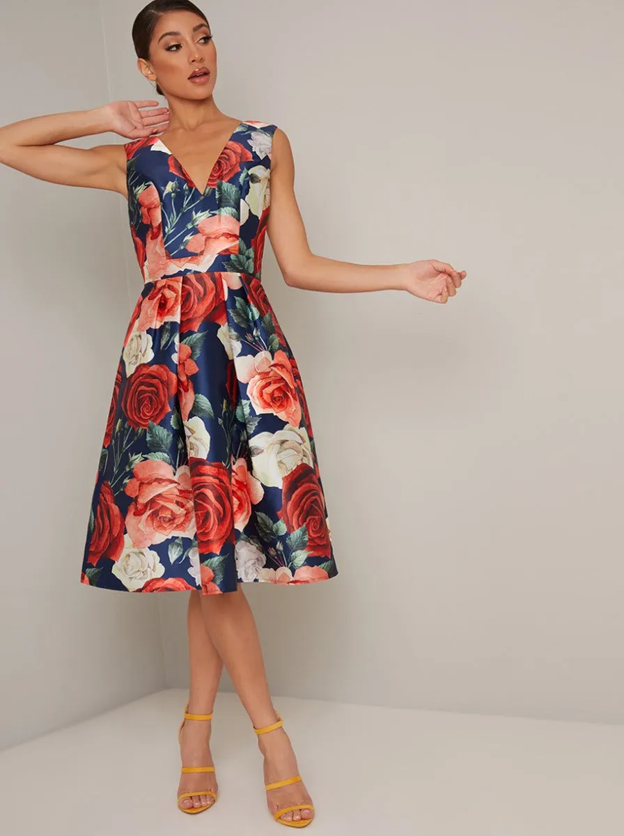 Bold Floral Print Box Pleat Midi Dress in Blue sold by Chi Chi London