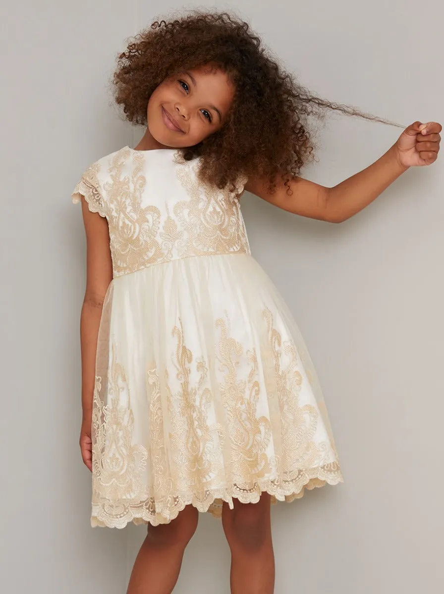 Girls Embroidered Lace Midi Dress in Cream sold by Chi Chi London
