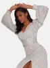 Long Sleeve V Neck Sequin Midi Dress in Silver sold by Chi Chi London