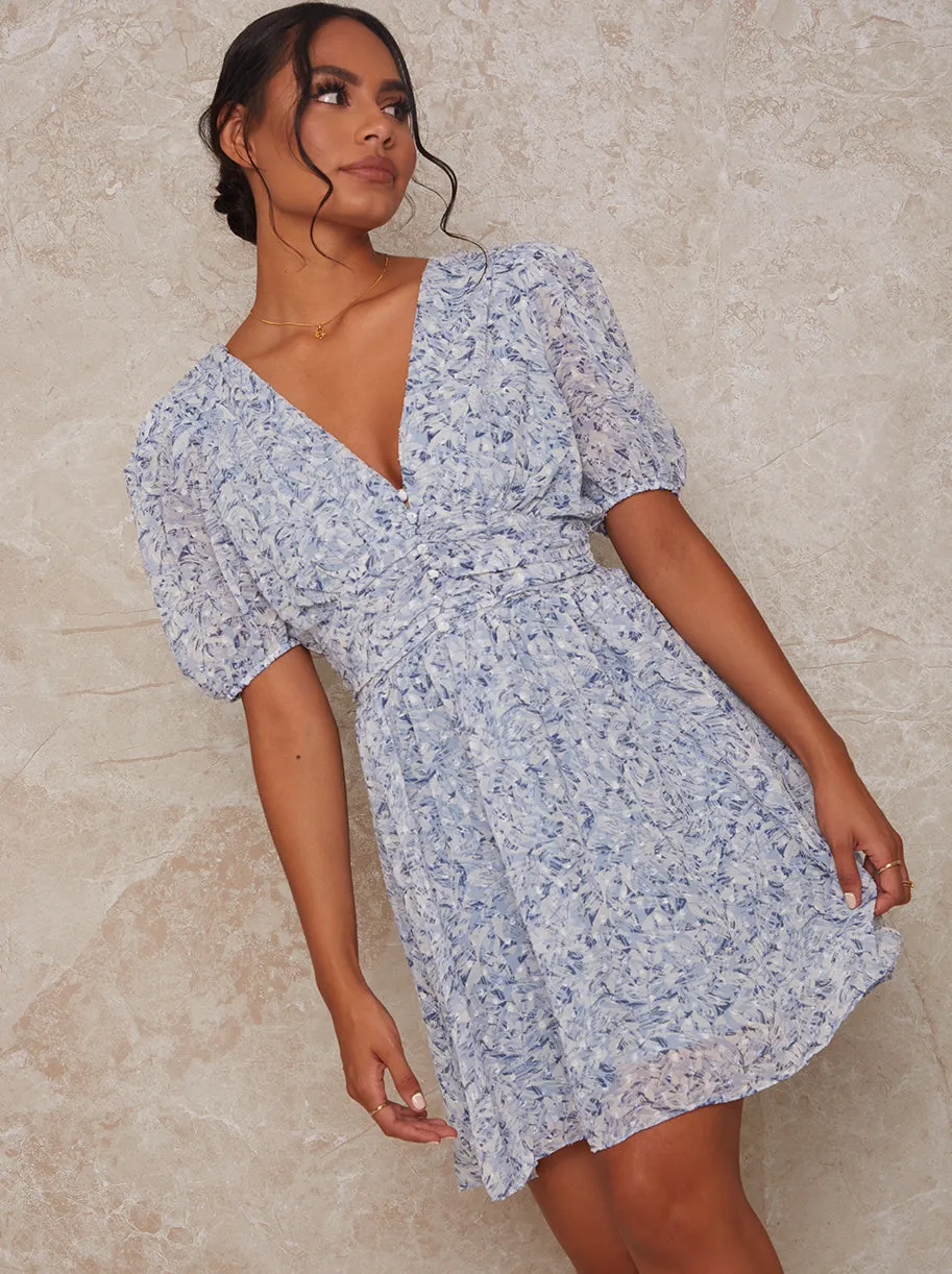 Puff Sleeve Floral Mini Dress in Blue sold by Chi Chi London