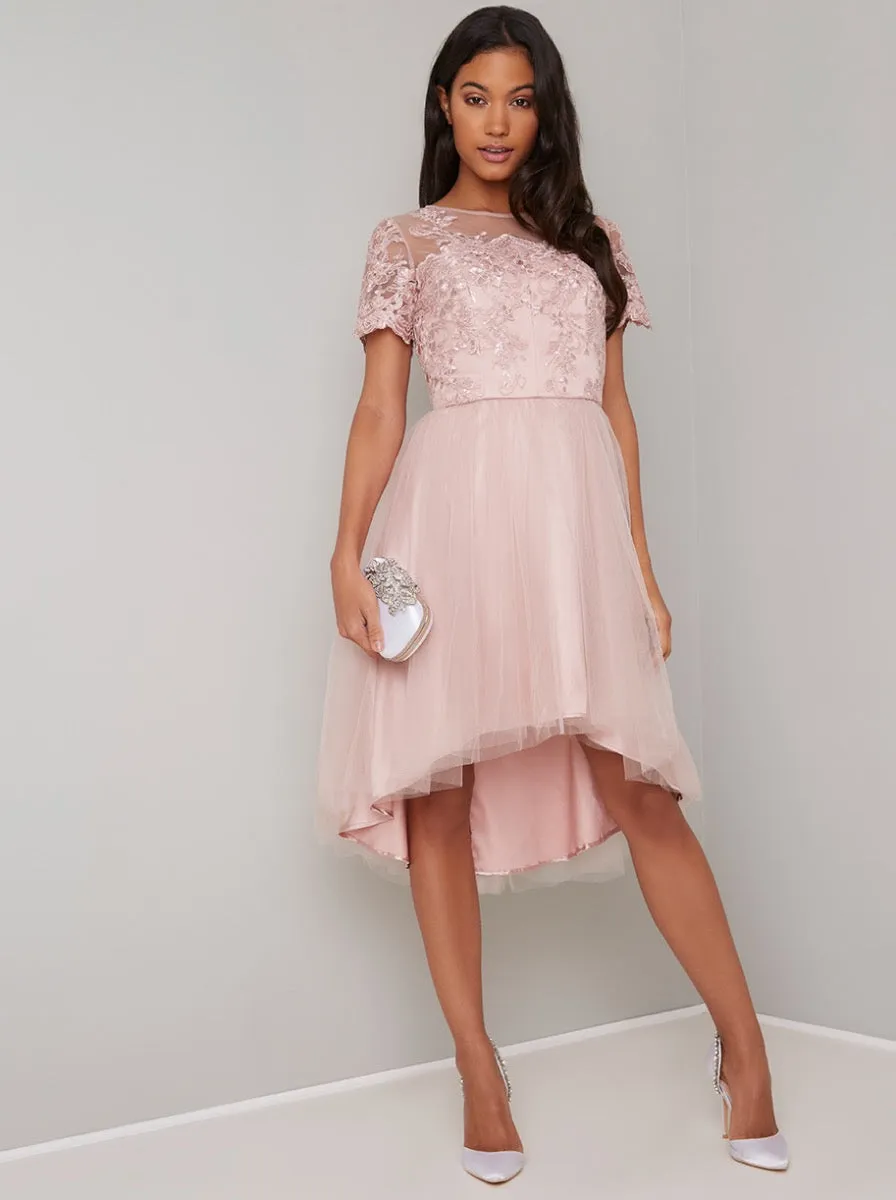 Emroidered Lace Bodice Dip Hem Midi Dress in Brown sold by Chi Chi London