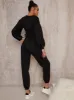 Ruched Detail Sweatshirt & Jogger Loungewear Set in Black sold by Chi Chi London