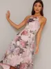 Cami Strap Floral Print Dip Hem Midi Dress in Pink sold by Chi Chi London