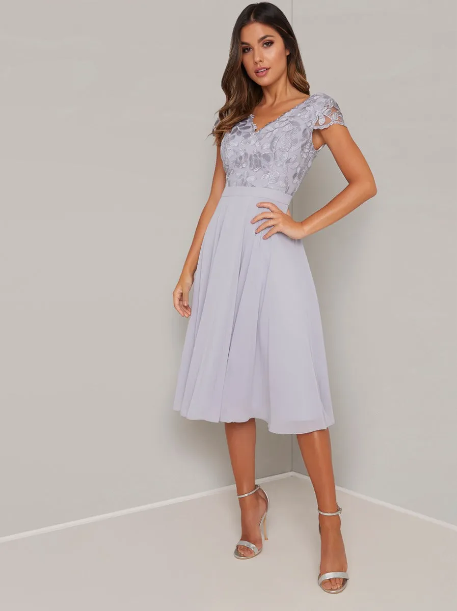 Embroidered Cap Sleeved Chiffon Midi Dress in Blue sold by Chi Chi London