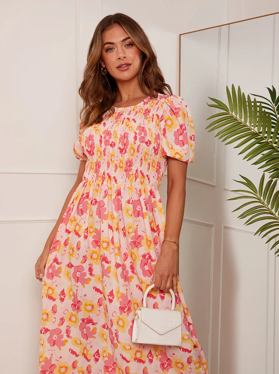 Short Sleeve Floral Shirred Midi Dress in Orange sold by Chi Chi London
